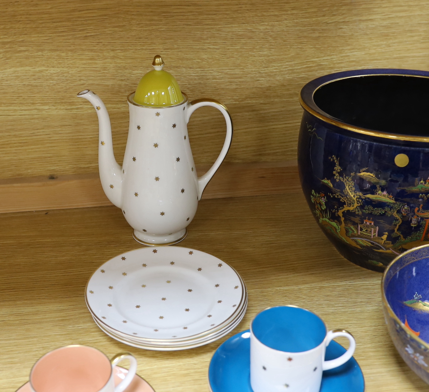 A Carlton ware powder blue jardiniere, similar bowl and oval dish with Oriental design together with a Susie Cooper part tea and coffee set, largest 19cm high